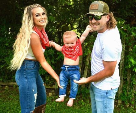 Morgan Wallen and Katie Smith with their child